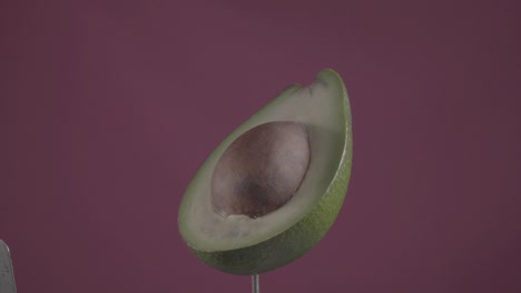 aguacate girando con bucle en la pantalla de fucsia para la llave de croma