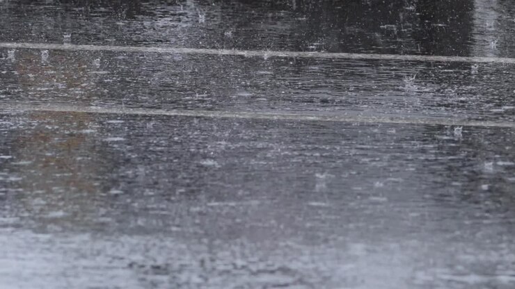 Raindrops hitting the road in Melbourne, Australia