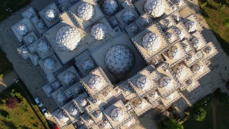 top down aerial shot of famous library in pristina, kosovo