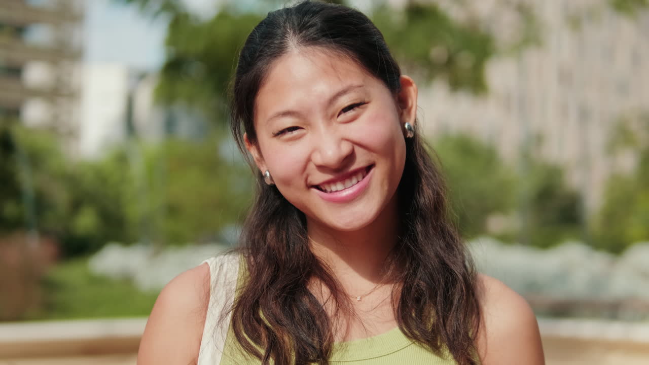 Asian girl with a notebooks, cute girl in the college standing outdoors and