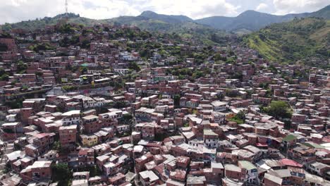 Layered-living-in-Comuna-13,-Medellin,-nestled-in-the-Aburrá-Valley,-Colombia---aerial