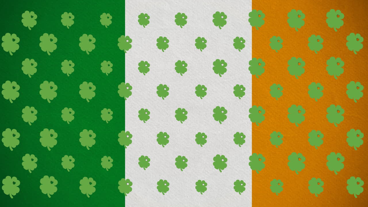 Animazione digitale di molteplici foglie di trifoglio che si muovono contro la bandiera irlandese.
