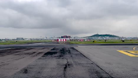 shot of plane landing at mexico city airport