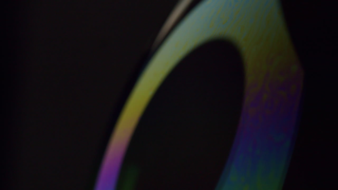 비누 방울에 투영되는 조명 애니메이션의 매크로 샷