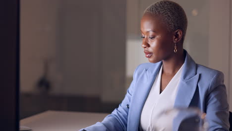 Night,-computer-and-black-woman-reading