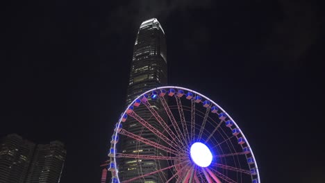 la rueda gigante en hong kong por la noche, 4k