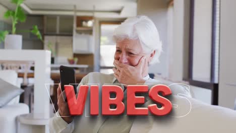 Animation-of-vibes-text-in-red-over-laughing-caucasian-senior-woman-making-smartphone-video-call