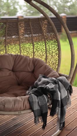 outdoor egg chair with blanket