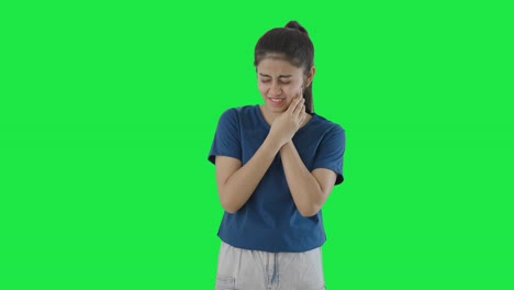 Indian-teenage-girl-having-a-toothache-Green-screen