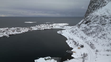 winter in picturesque fishing village of reine in norway's lofoten islands near gravdalsbukta bay