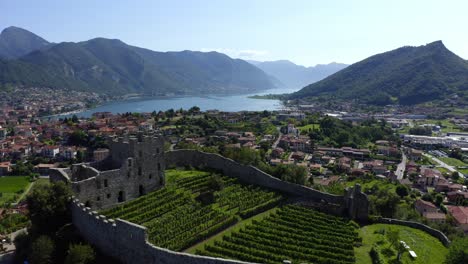 Aerial-View-Of-Ruins-of-Lantieri-Castle-On-Top-Of-Hill-In-Paratico-Now-Used-As-Vineyard