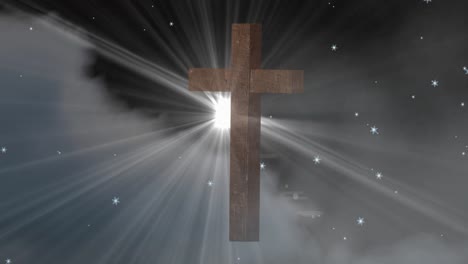 animation of christian cross and snow falling over glowing star and clouds