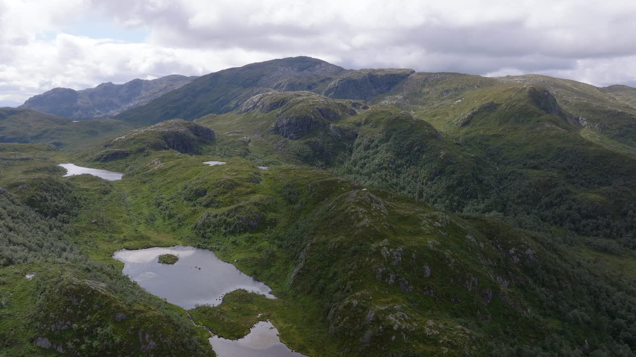 Aerial shot of Gullfjellet near Bergen, Norway, capturing rugged peaks, mountain ridges, and panoramic natural scenery
