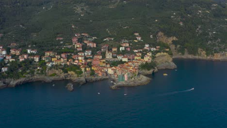 pull out, aerial shot of beautiful, colorful, coastal, ligurian village of tellaro, italy