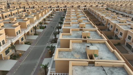 aerial drone view of endless rows of identical houses in bahria town, karachi, pakistan