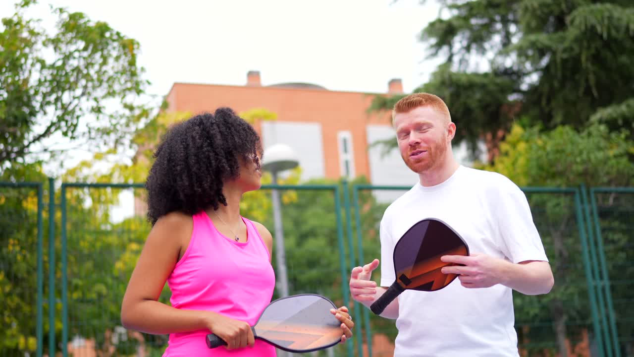 People Playing Pickleball Outdoors