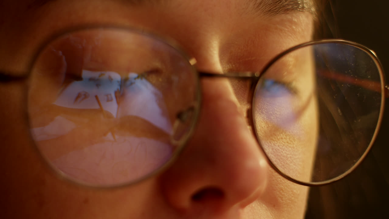 Close-up of woman wearing glasses