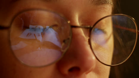 close-up of woman wearing glasses