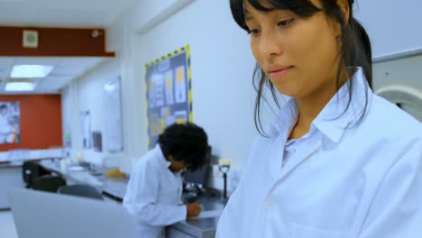 laboratory technician using laptop in blood bank 4k