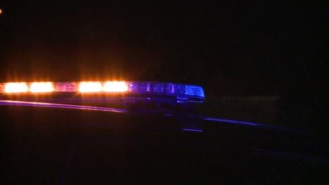 a beautiful shot of an american emergency vehicle's lightbar at night