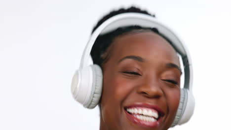 Happy,-dancing-and-black-woman-with-headphones