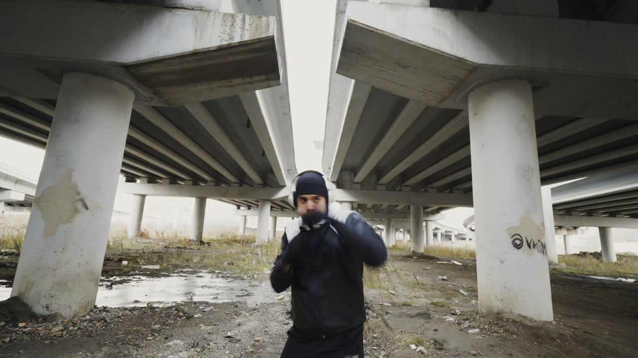 Man Boxing Under an Underpass