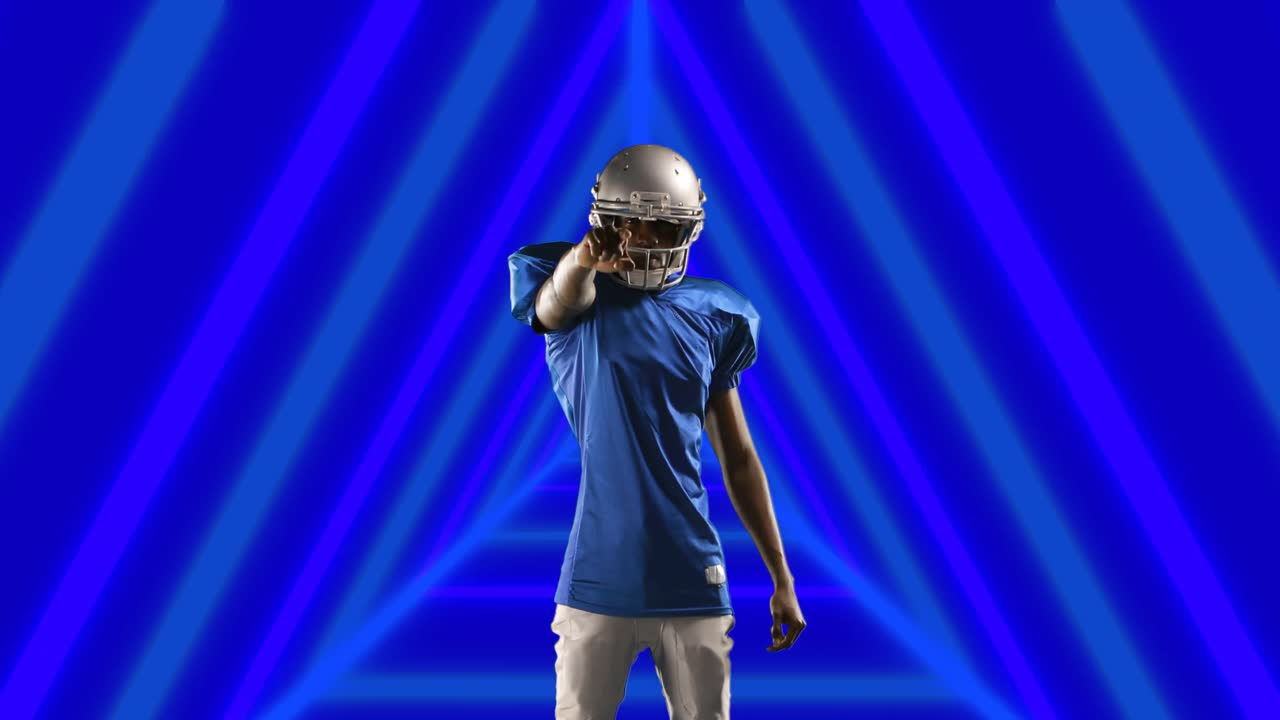 아프리카계 미국인 남성 럭비 선수 가 삼각형 모양 에 맞춰 헬 ⁇  을 착용 하고 있다