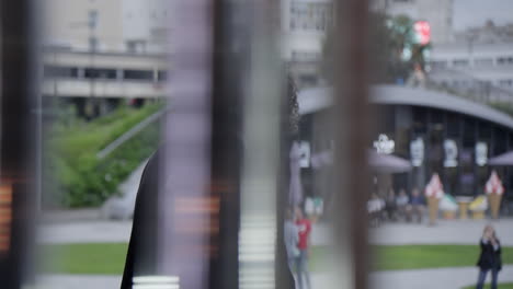man in kimono walking through city
