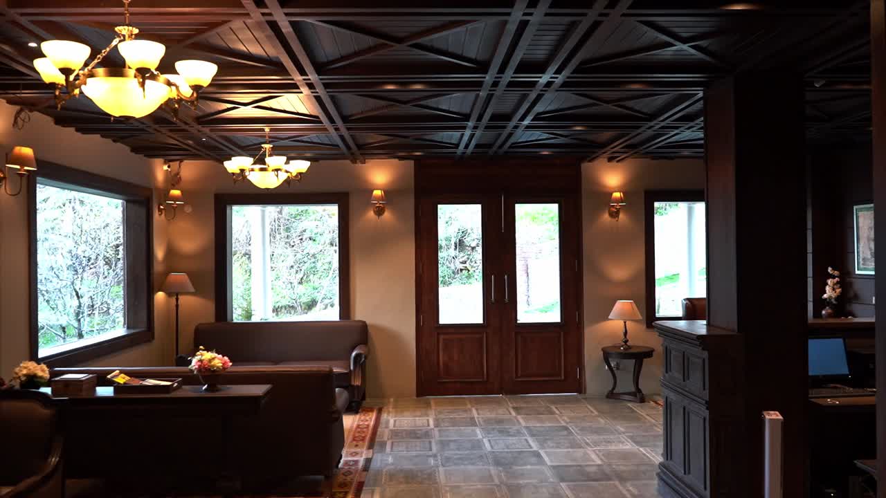 Modern Rustic Interiors And Well-Ventilated Hotel Lobby - Medium Shot Pan Right