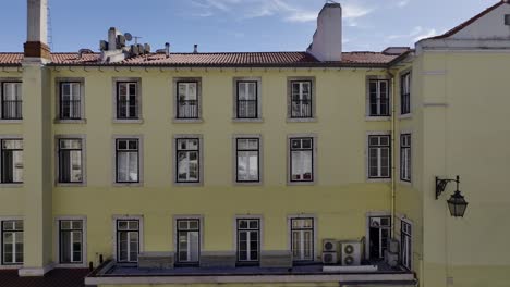 drone shot rising up over the apartment houses