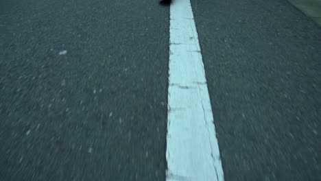 man walking in a hurry down the street