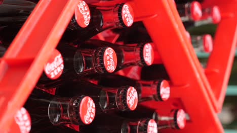 coca-cola zero bottles in a red crate