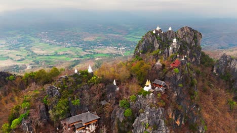 scenic aerial drone sky temple in lampang thailand mountaintop pagodas of wat chaloem phra kiat