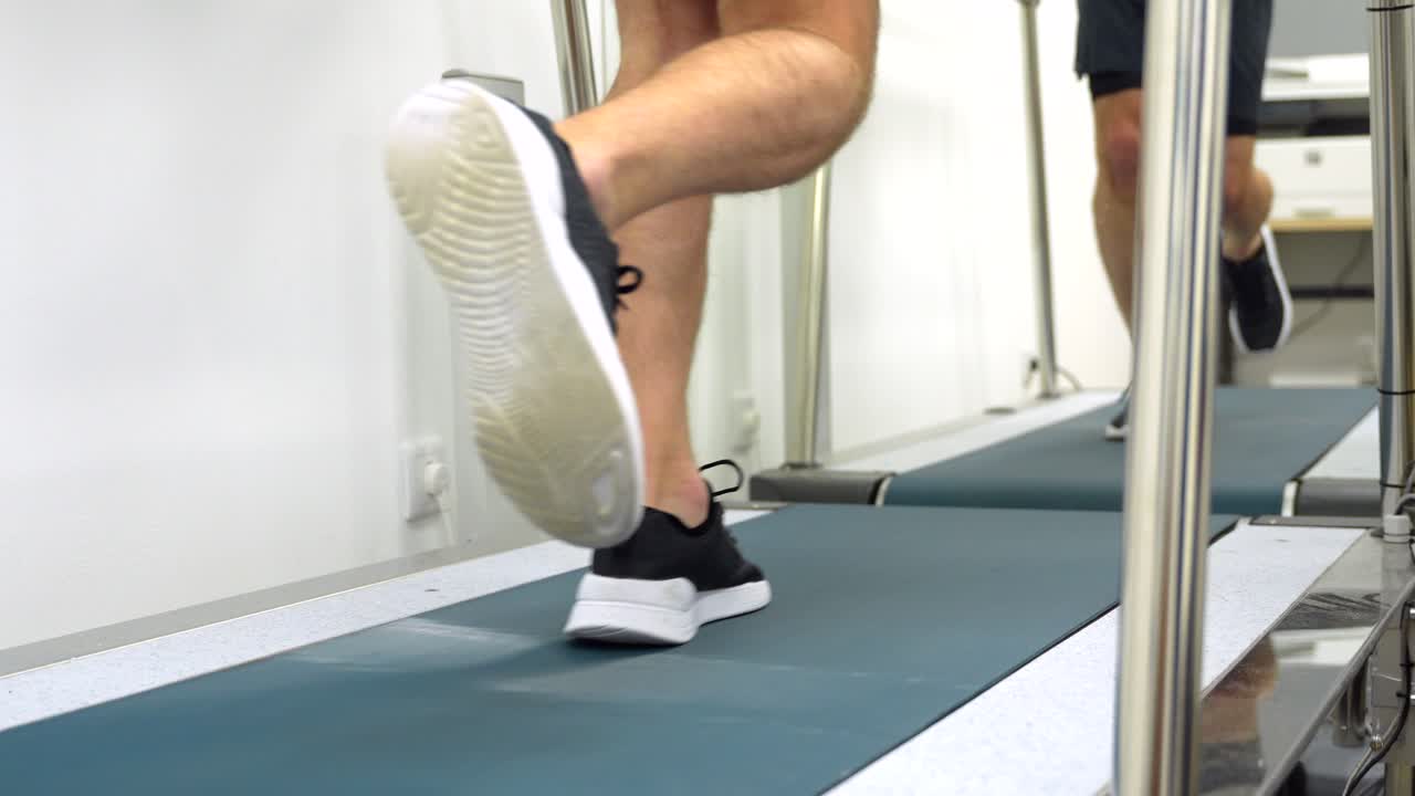 People Exercising on Treadmills