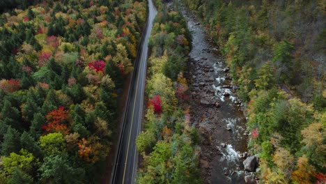 kancamagus highway in new hampshire during fall, aerial shot