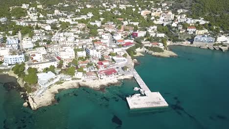 drone shot over the colorful island of aigina in greece