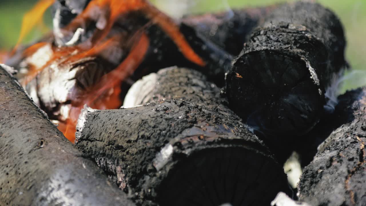 Close up shot of a smoking hot fireplace with a circular motion