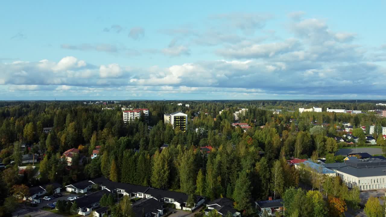 Bird's eye view of Kerava a rustic town with lots of greenery in Finland, tranquility and a clear horizon, Nordic summer