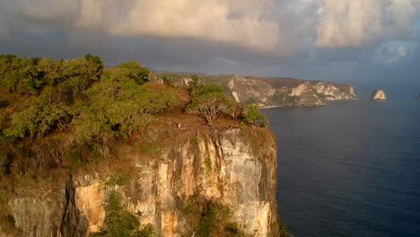 indonesia mountains rocks coast sea drone nusa penida