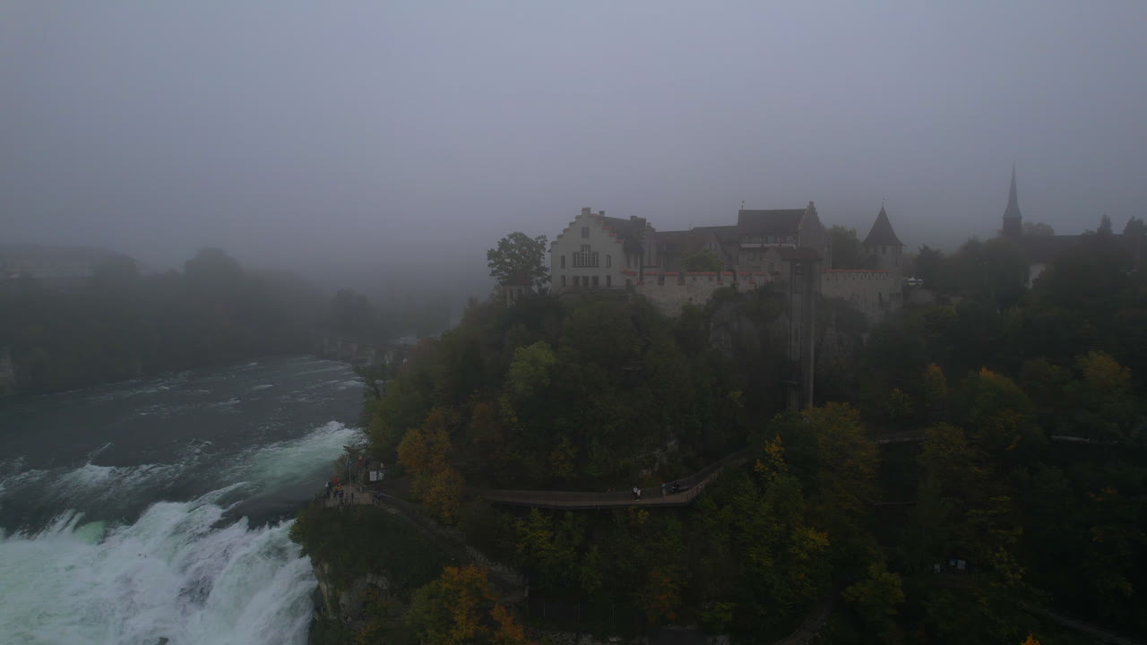 Fog surrounding Laufen Castle and Rhine Falls in Switzerland