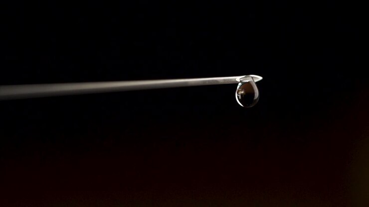 Syringe Needle with Liquid Drop