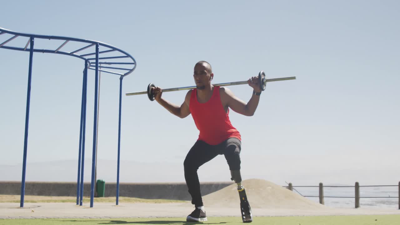 Front view man with prosthetic leg exercising