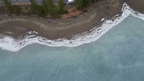 Klöntalersee-Glarus-Switzerland-overhead-view-of-beach-and-tourist-van-parked-on-the-road