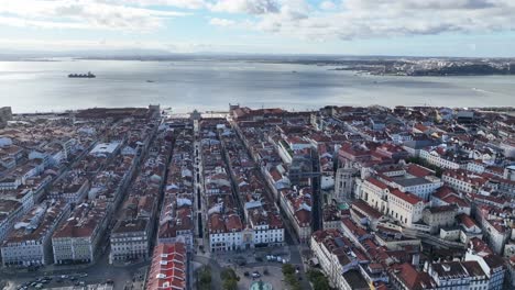 drone shot flying over central lisbon, portugal