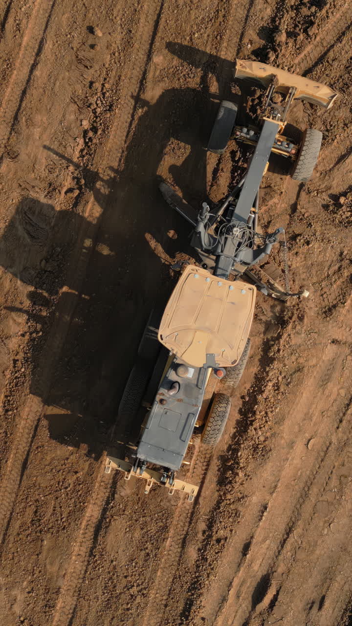 Aerial View of a Road Grader on a Construction Site