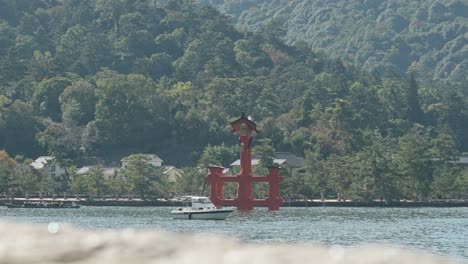 A serene view of the Itsukushima Shrine’s famous torii gate, a landmark of Miyajima Island in Hiroshima, Japan.