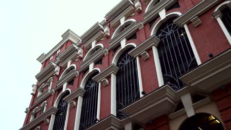 ornamental red brick building facade