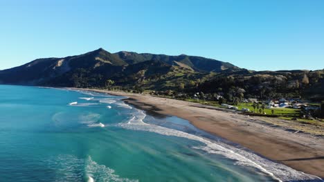 Aerial-view-of-beautiful-sunny-day-at-Tokomaru-Bay,-New-Zealand