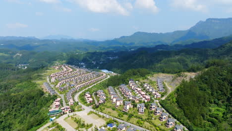 panoramic drone shot tilting in front of vacation homes, sunny day in china