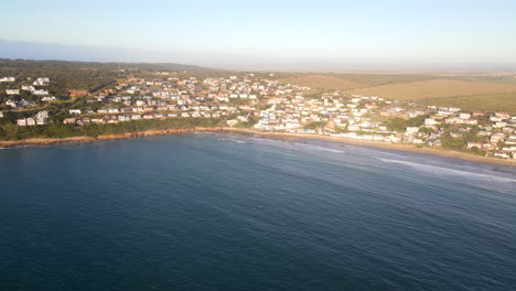 sunrise drone tilt-up reveals scenic holiday town vleesbaai near mossel bay